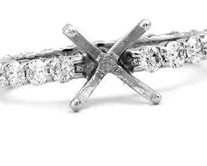 Platinum Share-Prong Mounting, 22 Round Brilliant Diamonds, 1.10ct. tw.