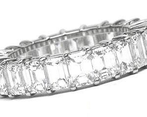 Platinum Shared-Prong Eternity Band, 23 Emerald Cut Diamonds, 5.76ct. tw.