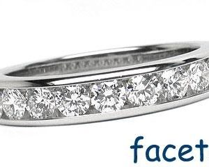 Platinum Channel-Set Wedding Band, 9 Round Brilliant Diamonds, 0.75ct. tw.